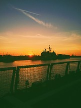 silhouette of a ship at sunset 