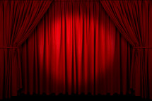closed curtains on stage 