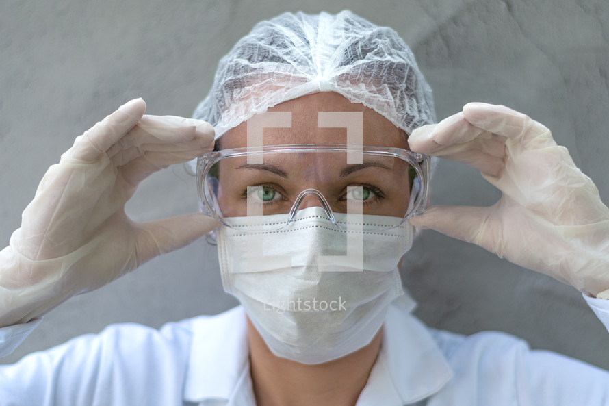 Doctor wearing protection face mask. Virus or bacteria cells. Global alert. Epidemic flu. Coronavirus. Medical staff preventive gear.