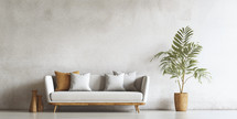 Contemporary minimalist interior with a trendy sofa, earth-toned cushions, and a lush potted plant.