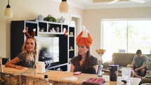 women wearing turkey hats 
