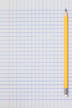 sharpened pencil on graph paper 