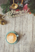 Merry Christmas sign and latte 