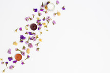 dried flowers and candles on a white background 