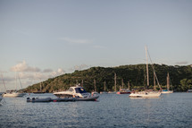 boats anchored near shore 
