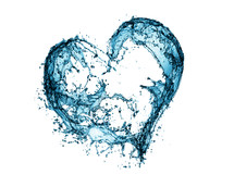Water splashes into the shape of a heart on a white background.