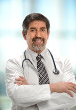 doctor with a stethoscope around his neck 