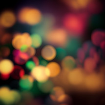 A colorful shot of lights out of focus creating a bokeh pattern