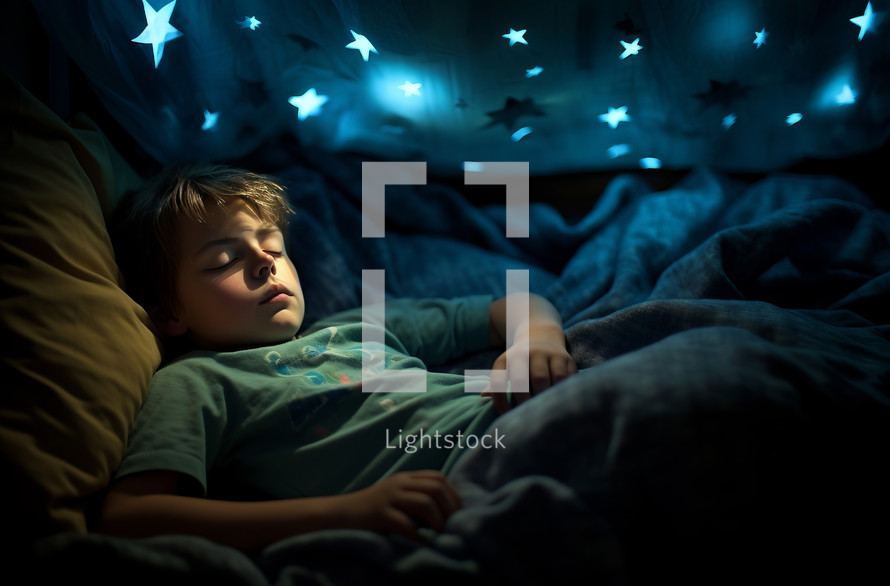 A young boy peacefully rests in bed, enveloped by the gentle, soft blue glow of star projections