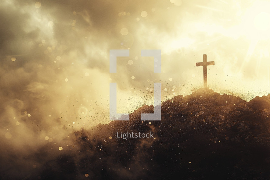 Cross on a hill with light shining through clouds