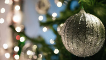 Silver Christmas ball on tree with copy space