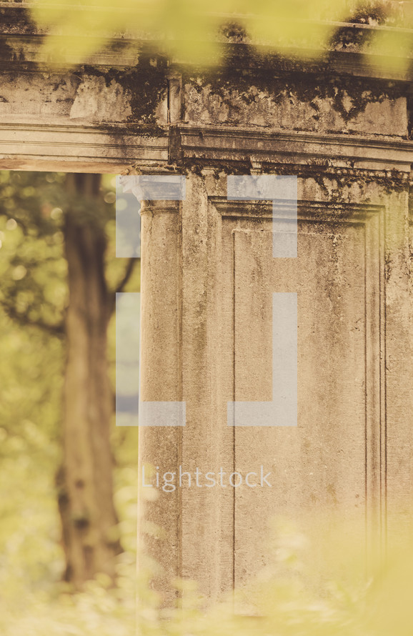 weathered stone columns outdoors 