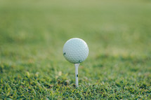 golf ball on a golf tee