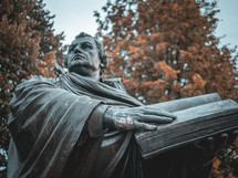Statue of Martin Luther holding a bible