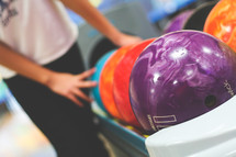 bowling balls at a bowling alley 