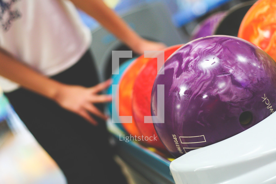 bowling balls at a bowling alley 