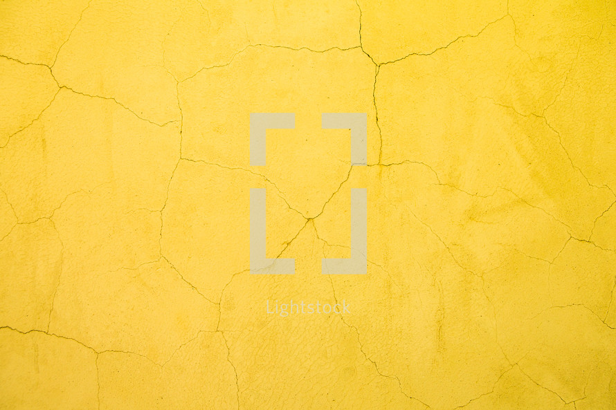 yellow cracked wall background 
