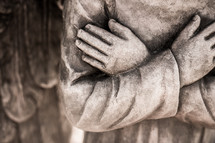 closeup of statue  - angel hands 