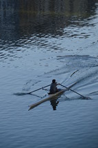 canoe in blue water.