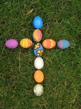 Cross out of colored eggs