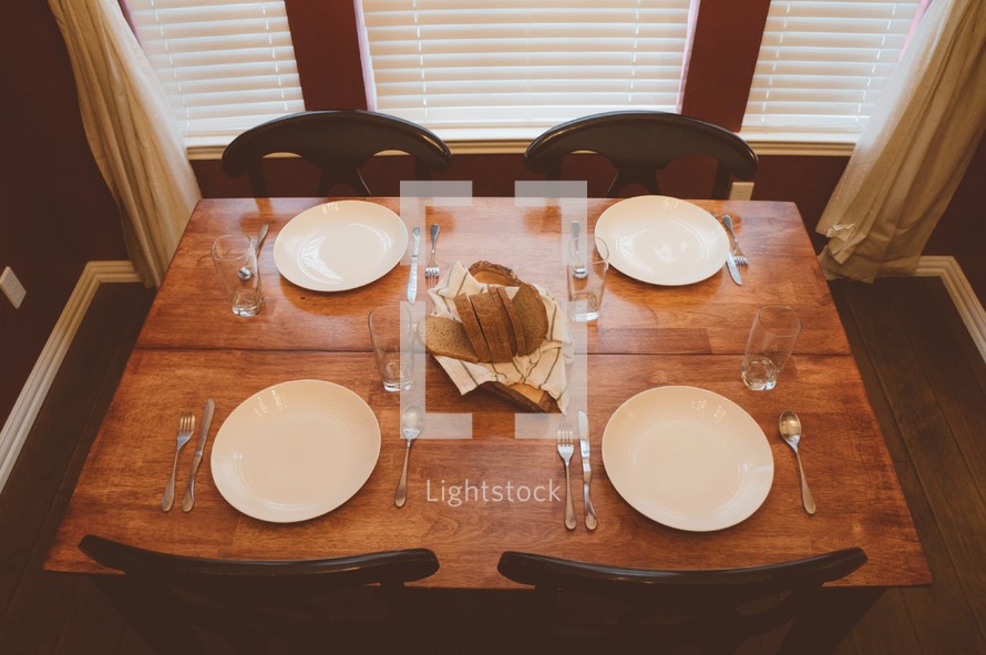 A dining table set for a meal.