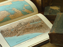 old books with maps of Israel, 
