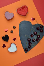 hearts shapes, colored paper, and slate 