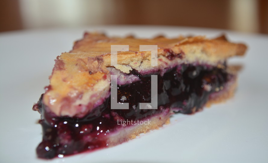 Slice of blueberry pie.