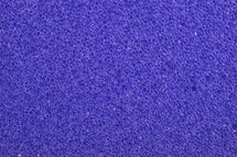 close-up of puple sponge surface as texture background
