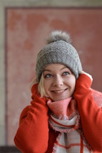 smiling woman in a beanie 