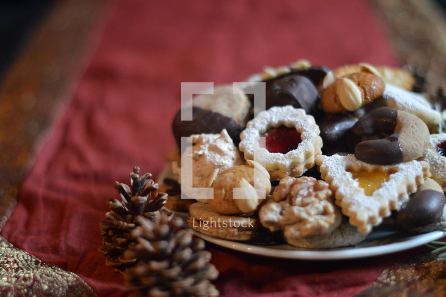 christmas cookies on a plate with christmas decoration.