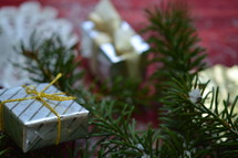 pine garland and Christmas present ornaments 