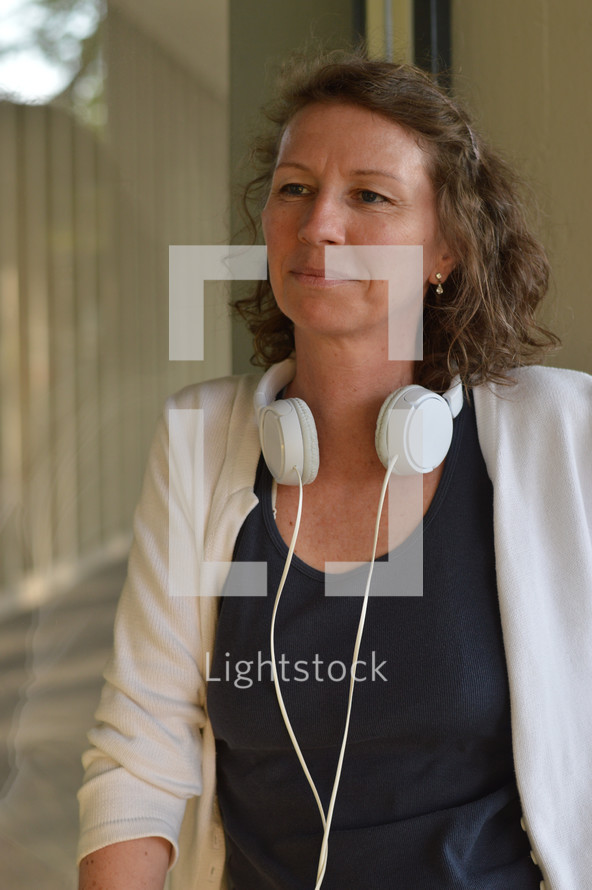 a woman with headphones 