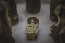 baby Jesus figurines in a Nativity scene 