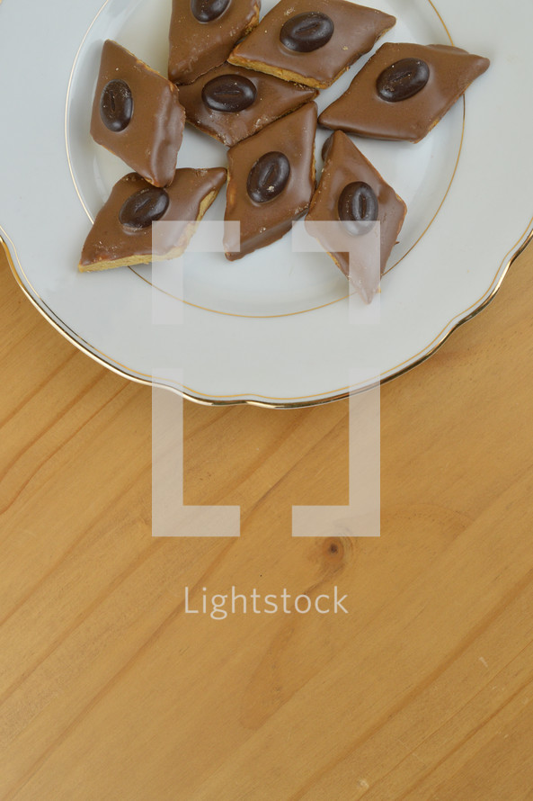 diamond shaped cookies on a plate 