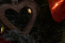 wooden heart ornament on a Christmas tree 
