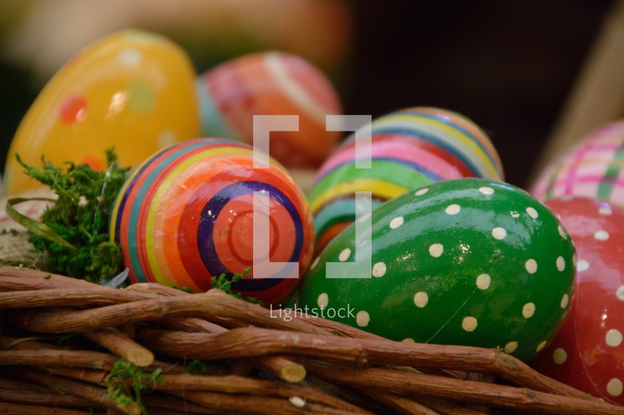 Colorful Easter eggs in a basket 
