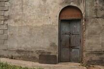 Old wooden doorway with double doors