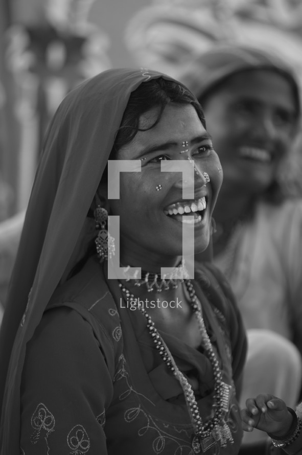 a smiling woman in India 