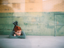 model, woman, lying down, sidewalk, redhead, outdoors, posing, short hair 
