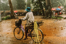 man riding a bicycle in Cambodia 