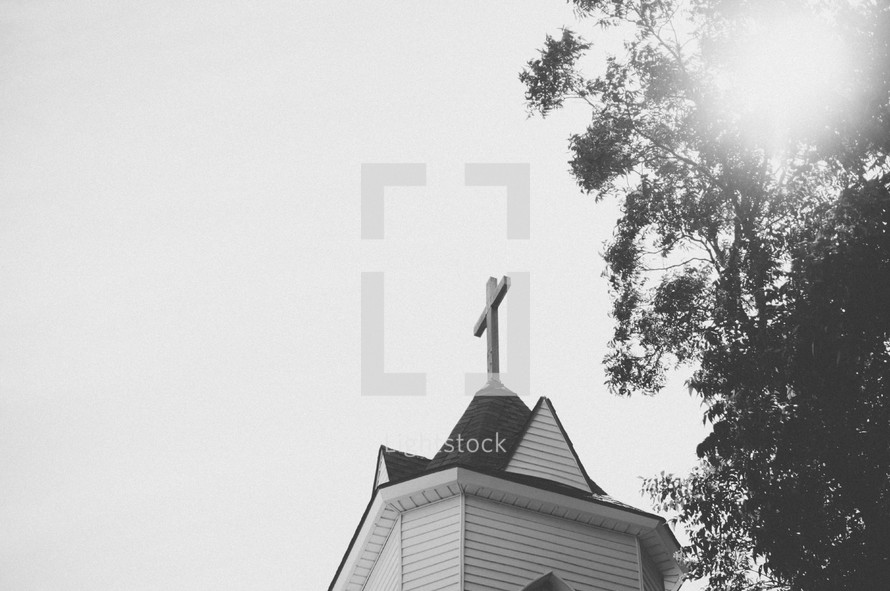 cross topper on a church steeple 