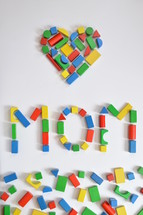 heart shaped blocks and the word mom 