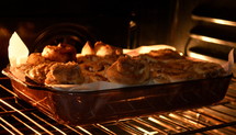 cinnamon buns in a pan in the oven 