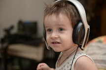 toddler with headphones 