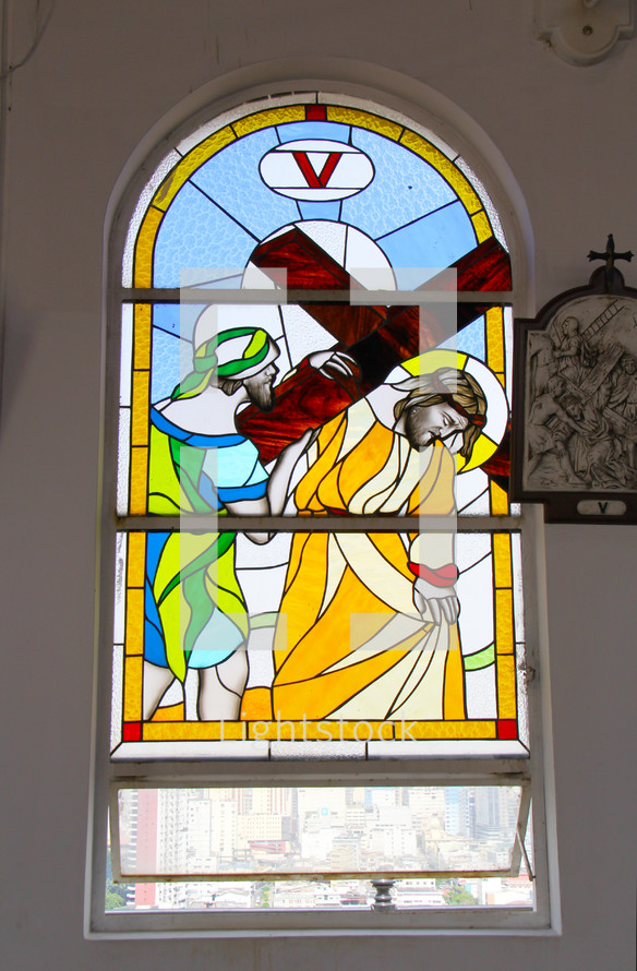 Stained glass window depicting Stations of the Cross. Number  5