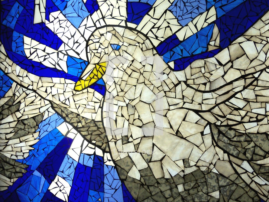 A tile mosaic of the Holy Spirit taking the form of a Dove in a stained glass mosaic style tile pattern on the wall of a church or cathedral building. 
