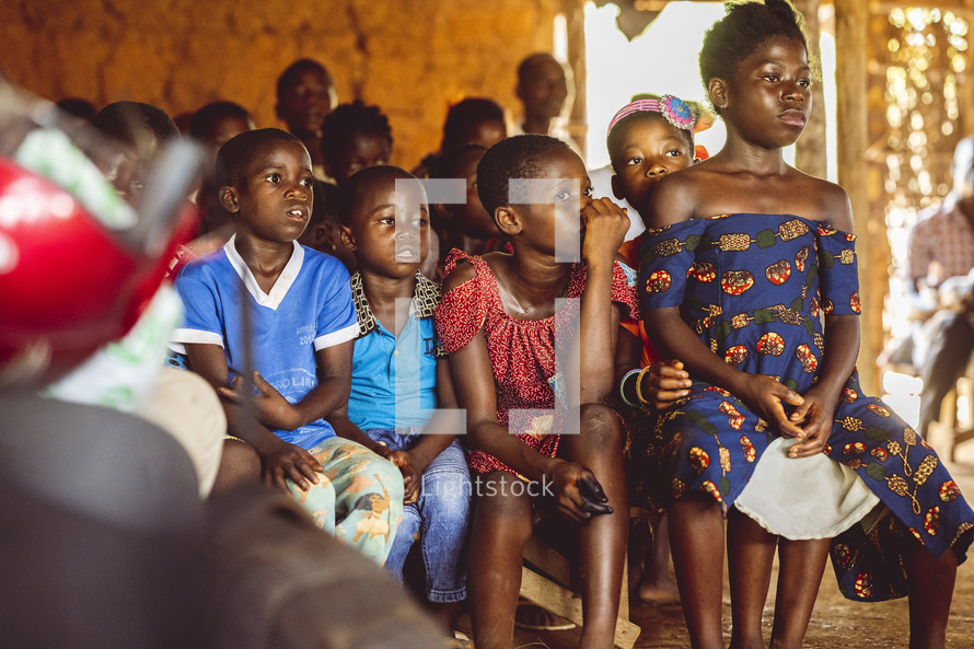Christian African children sitting in church in a small village church in the Ivory Coast in west Africa