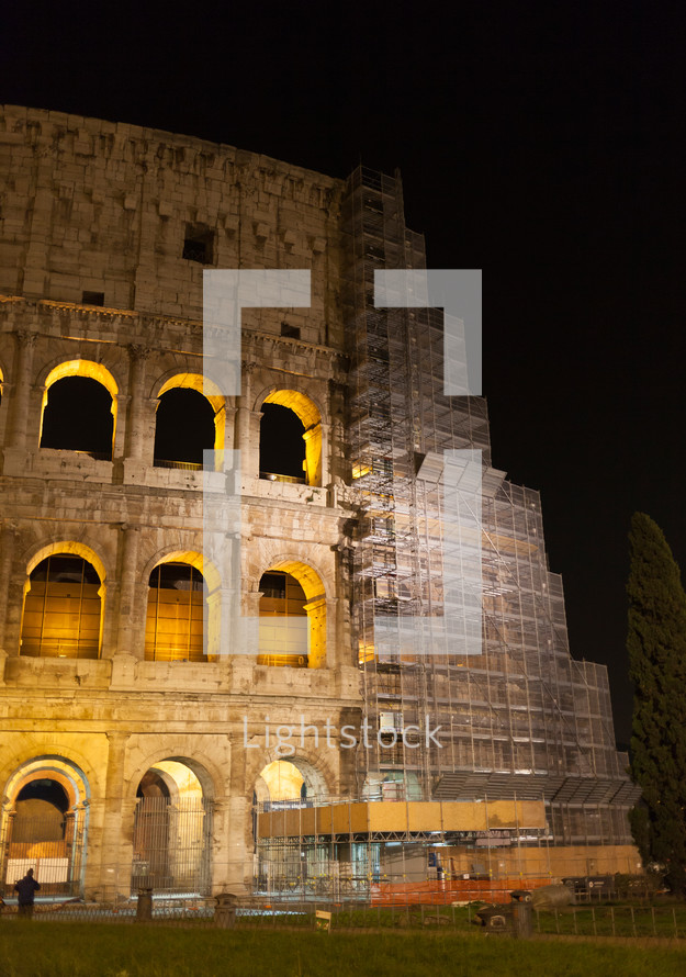 Colosseum by night with restoration works, Rome 2015, Italy.