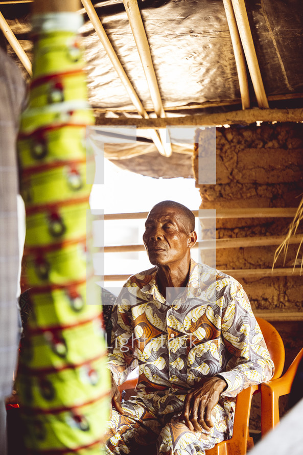 Christian African man in a small village church in the Ivory Coast in west Africa